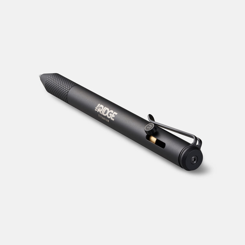 Ridge Bolt Action Pen in matte black titanium, angled view showing clip, bolt knob, and Ridge logo.