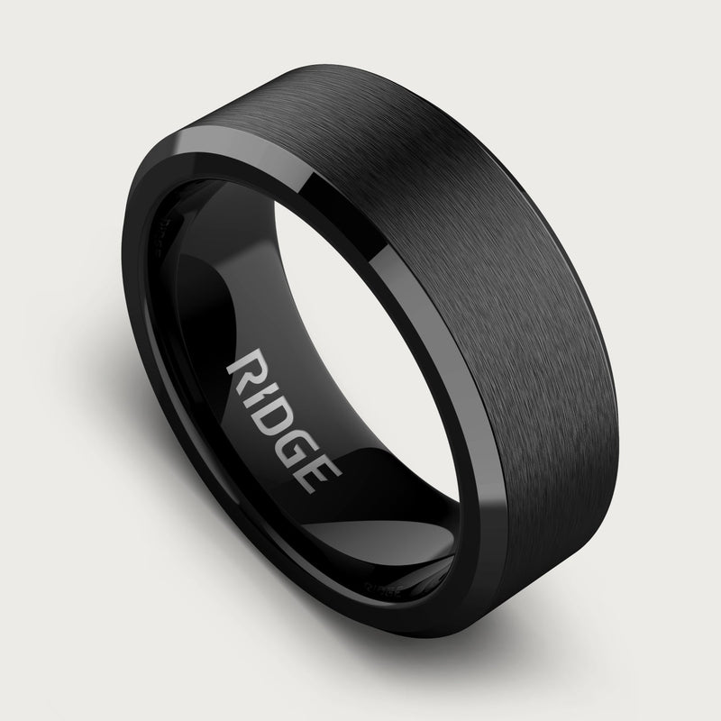 8mm Beveled Ring Set - Royal Black ring with brushed black finish and polished beveled edges, close-up angled view on white background.